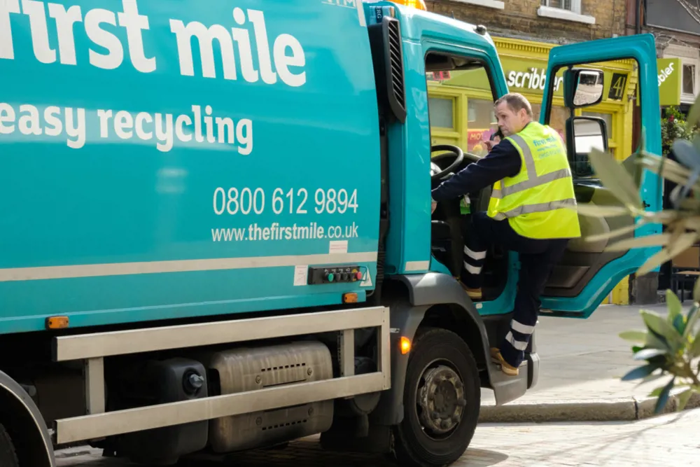 First Mile worker disembarking from a truck