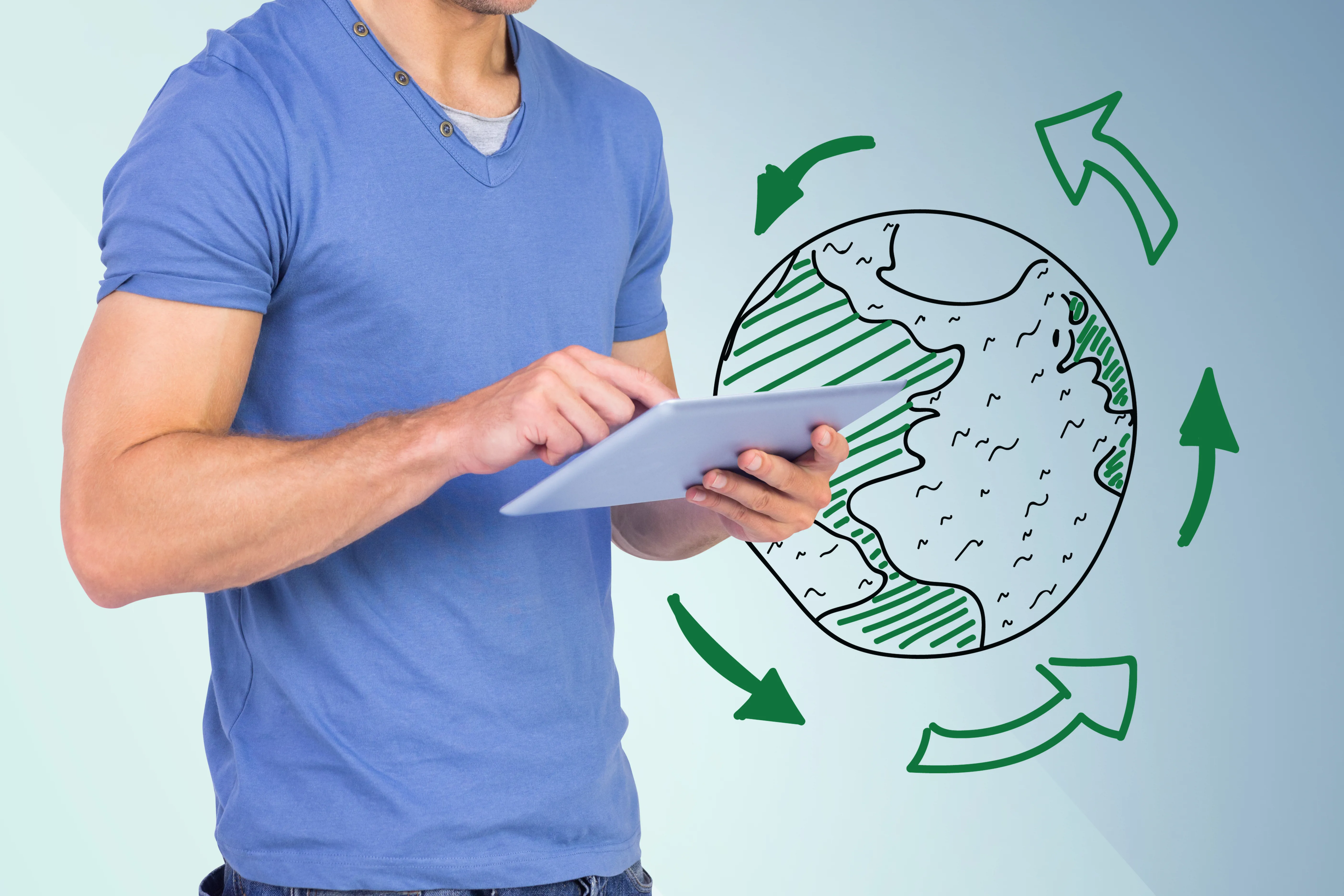 man with tablet device with world drawn in background