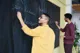 men writing on chalkboard