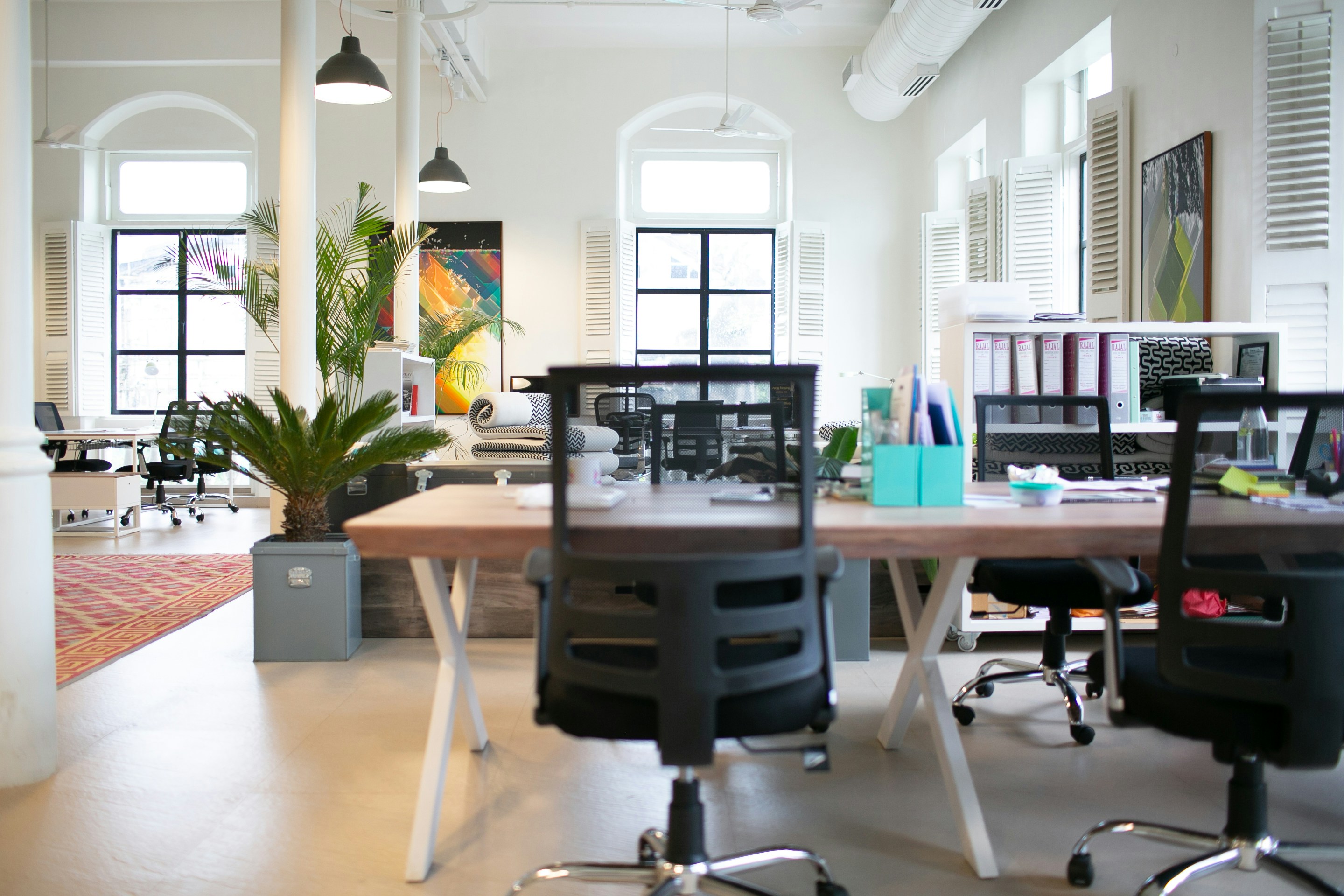 A large office space with desks and chairs