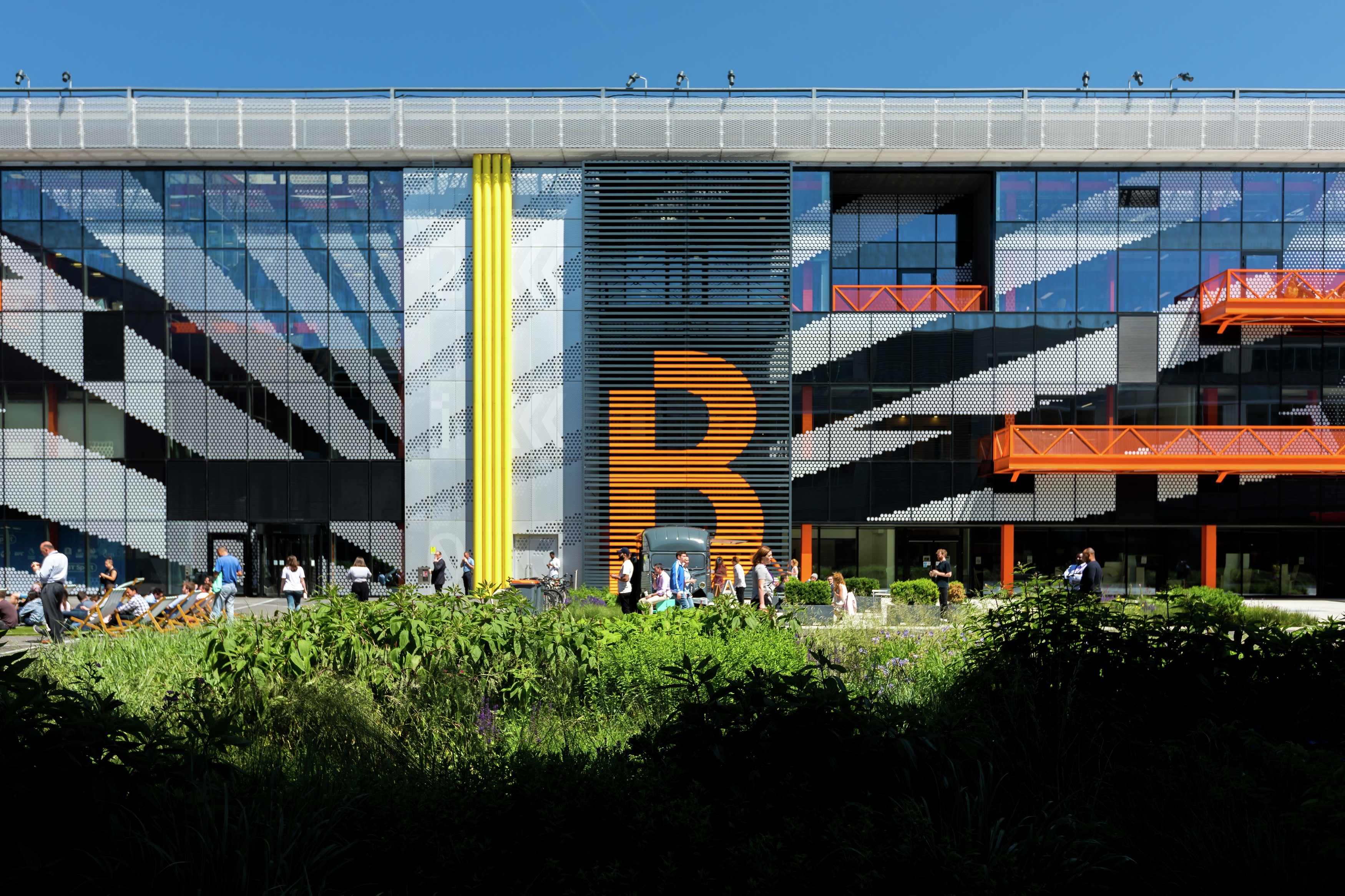 Exterior view of the Here East building, a hub for innovation and technology