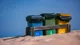 Recycling bins on sand