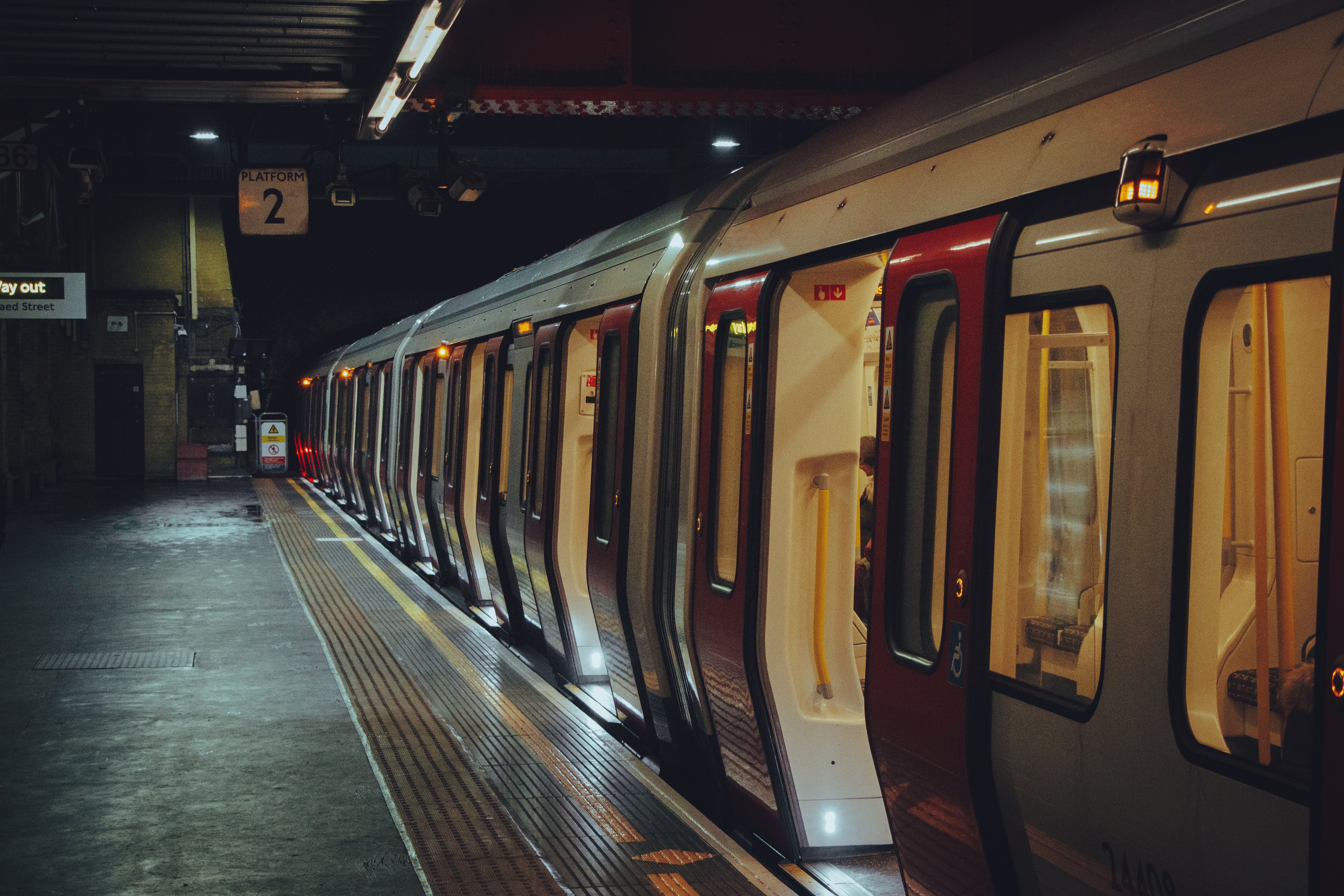 A london underground train stopped at a platform
