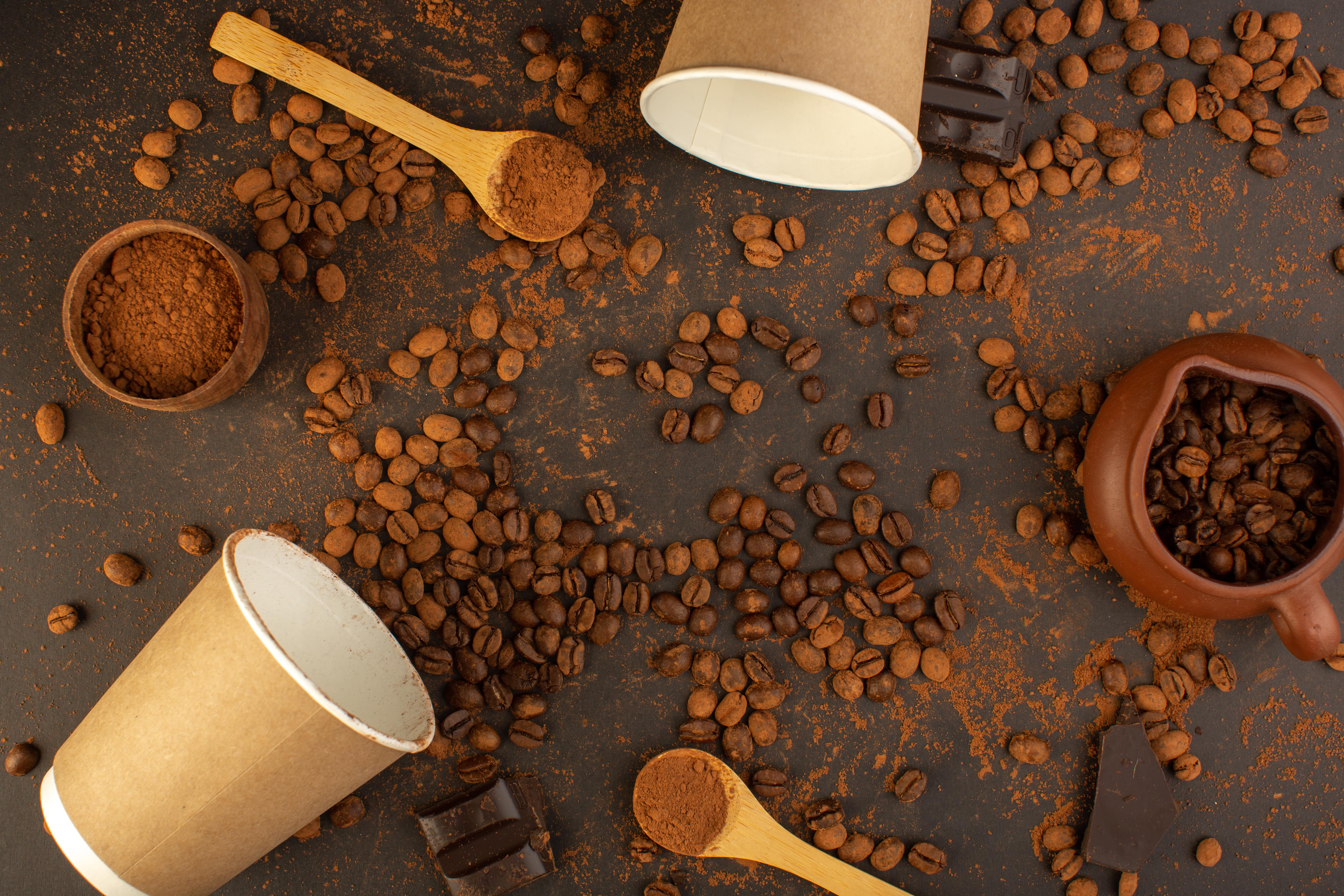 Top view of coffee beans on a table, highlighting sustainable packaging