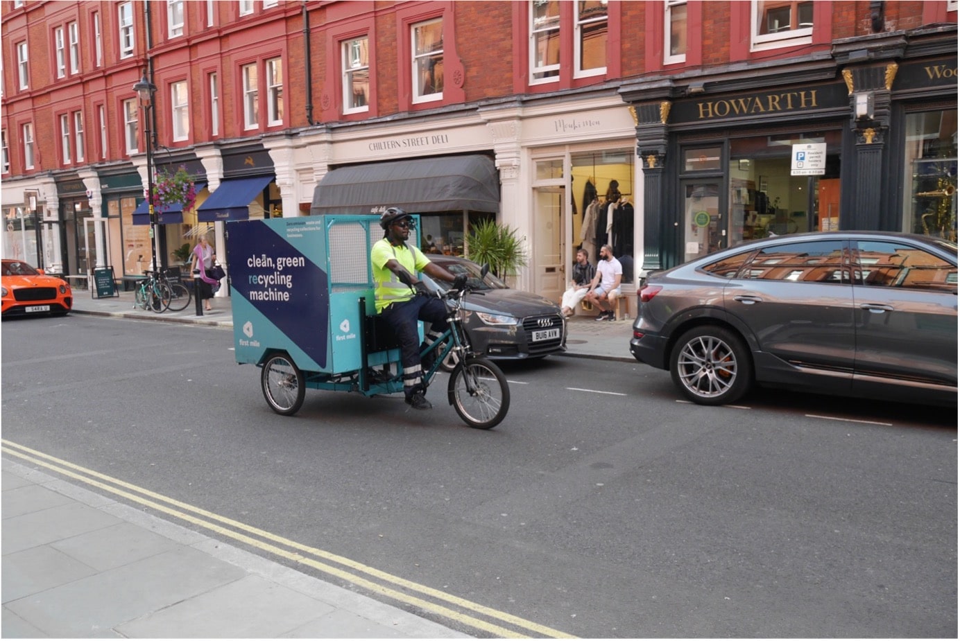 Another view of Baker Street a man on a first mile collection bike