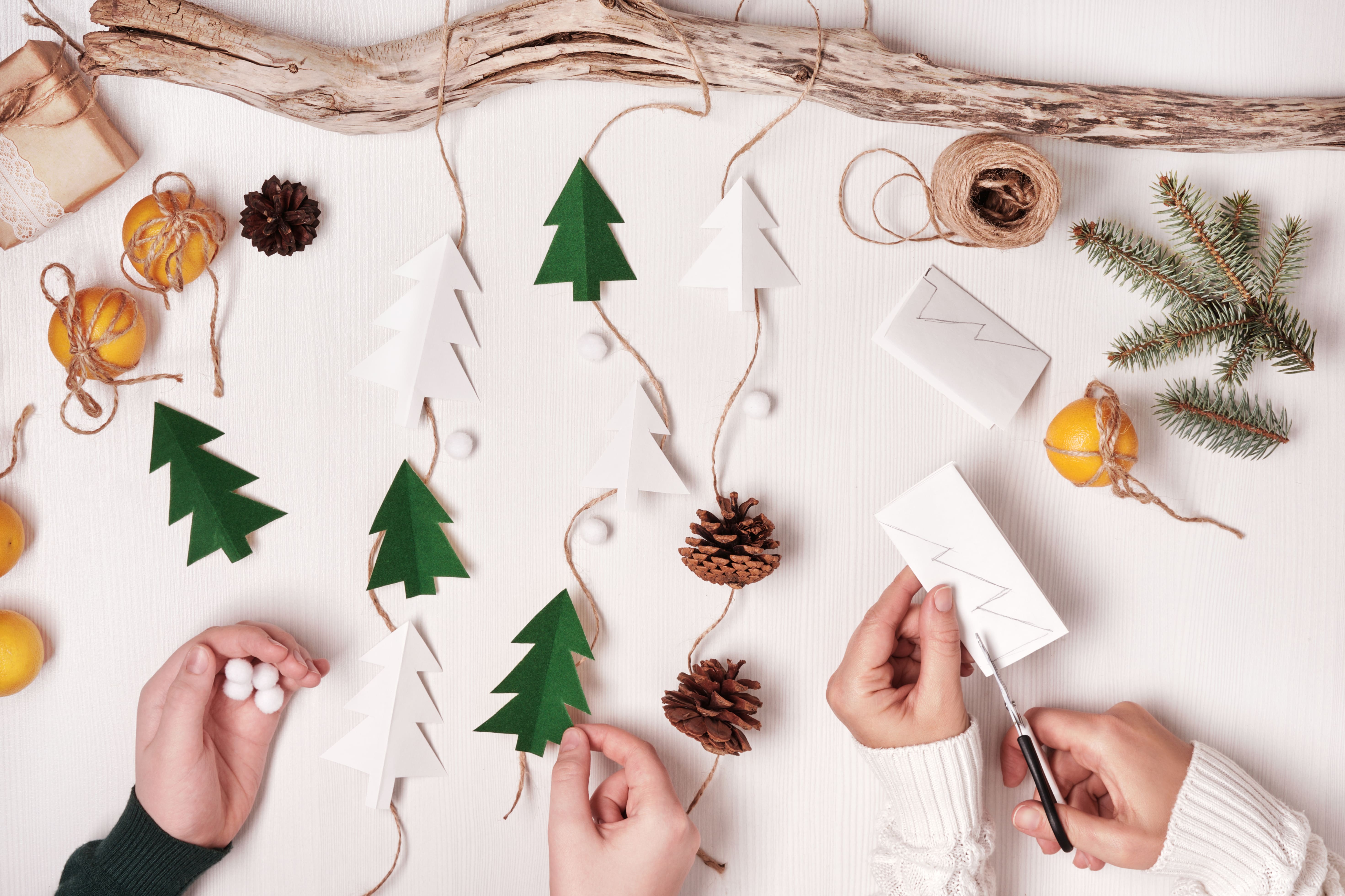 DIY Christmas home decor made from natural materials such as wood and greenery