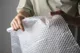 A chair covered with bubble wrap